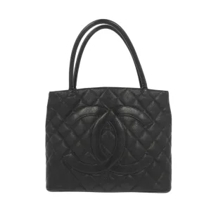 CHANEL Medaillon Handbag in Black Leather