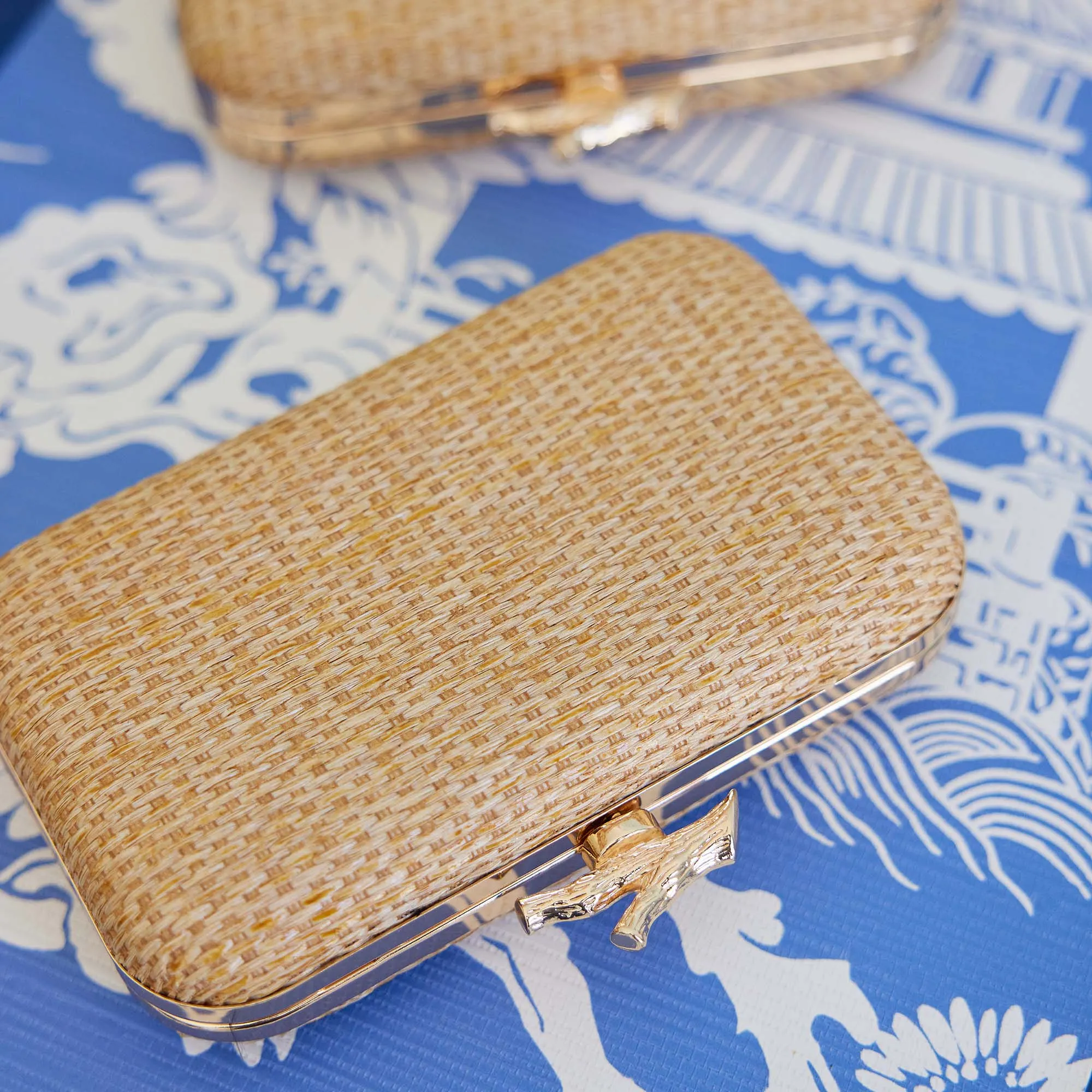 Coral Woven Clutch