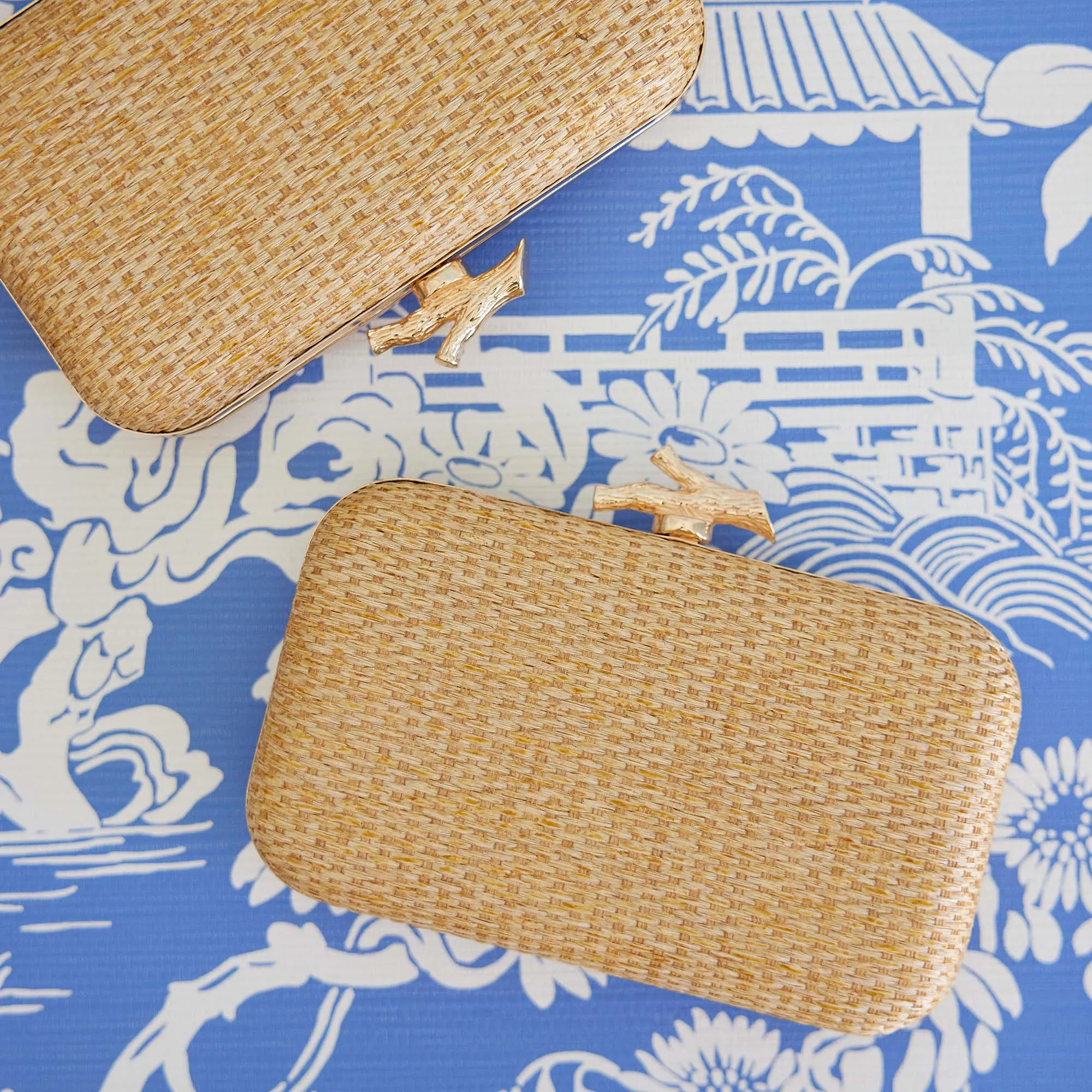 Coral Woven Clutch