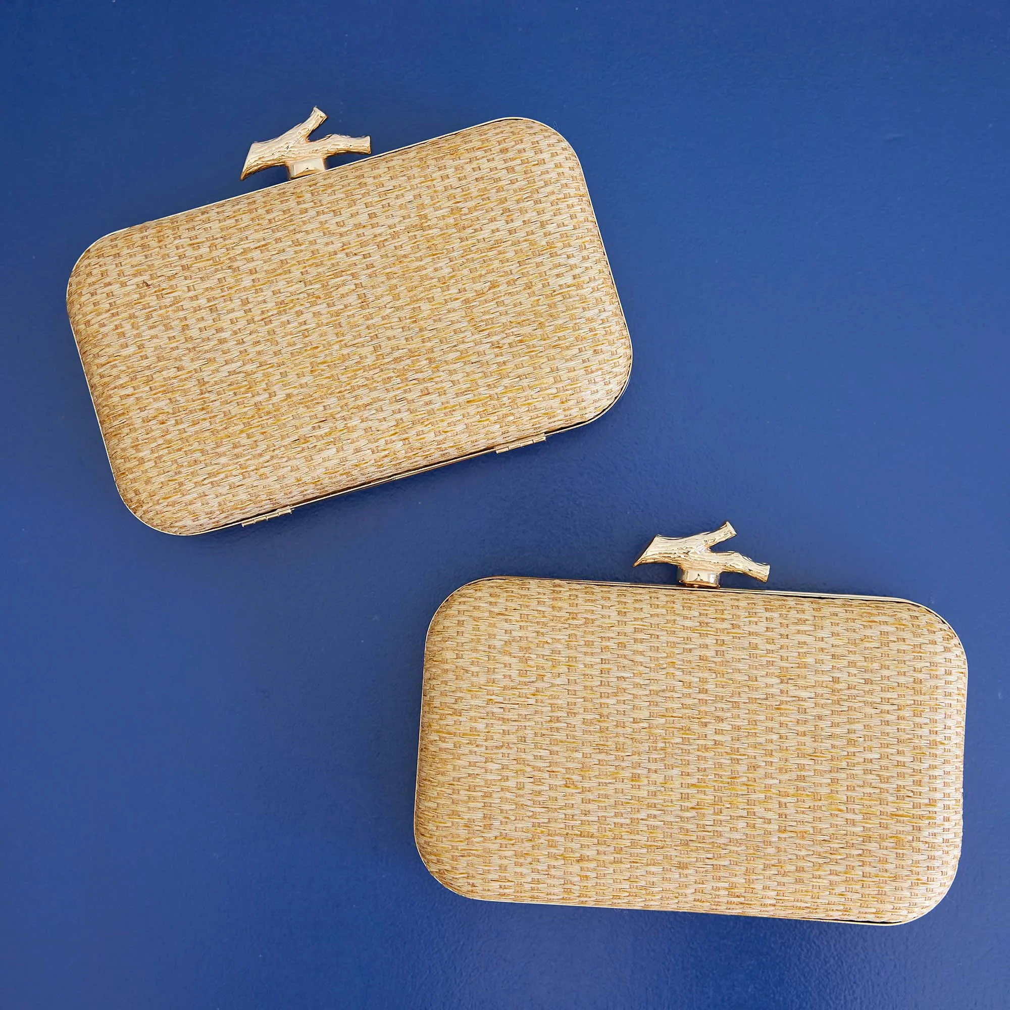 Coral Woven Clutch